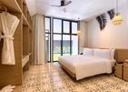 Outrigger Surin Beach Resort