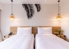 Outrigger Surin Beach Resort
