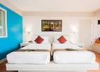 Outrigger Surin Beach Resort